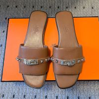 Hermes Giulia Slides Women Calfskin with Medor Studs In Brown