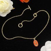 Hermes Mini Maillon Pendant Necklace In Gold/Orange